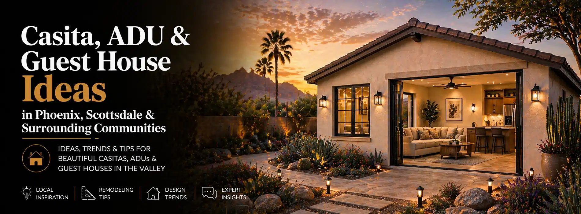 A cozy, modern casita with large windows and warm lighting sits amid desert landscaping at sunset, framed by palm trees and mountains. Discover inspiring guest house and ADU ideas for Arizona communities.